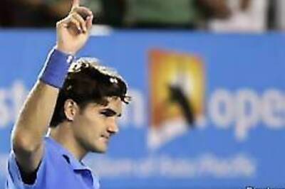 Federer made to sweat for a place in fourth round
