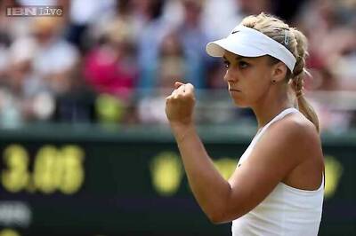Lisicki holds nerve to sweep past Ivanovic at Wimbledon