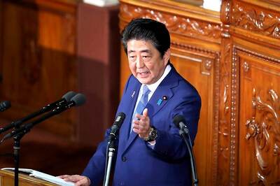 Japan's Cabinet Approves Record $900 Billion Budget, Aims to Soften Sale Tax Blow