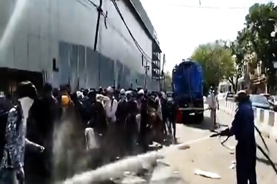 Migrants Waiting For Medical Screening Sprayed With Disinfectant in Delhi