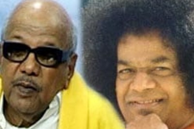 Karunanidhi shares dais with Sai Baba