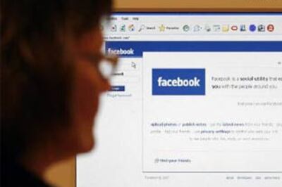 Workplace headache: employees hooked to Facebook