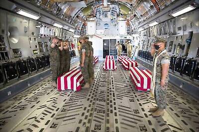 Flag-draped coffins of troops from sunken tank sent to Dover