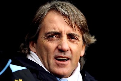 Mancini rues missed chances as Man City draw