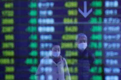 Gold charges toward $2,000, stocks climb on stimulus hopes