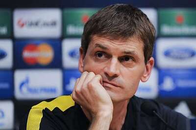 Vilanova back in charge for Barca after surgery