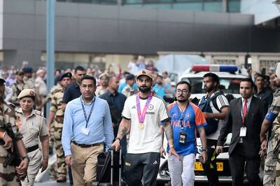 Indian Cricket Team Lands in New Delhi as Fans Brave Rain to Welcome Players
