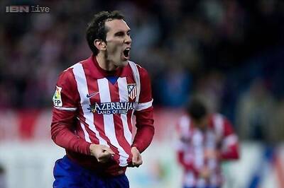 High-flying Atletico knock Valencia out of Cup