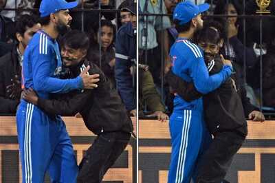 WATCH: Fan Hugs Virat Kohli, Touches Cricketer's Feet Before Getting Detained for Invading Pitch