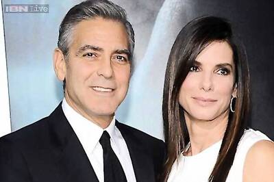 Why is Sandra Bullock upset about George Clooney's engagement to Amal Alamuddin?