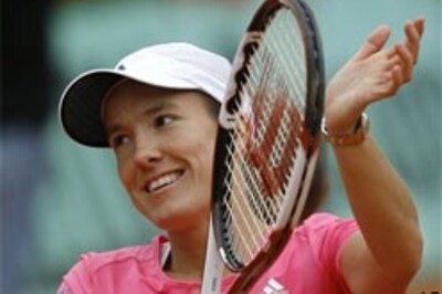 French Open: Henin, Serena advance
