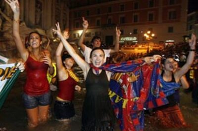 Fans go wild as Barcelona return home