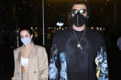 Arjun Kapoor Protects Girlfriend Malaika Arora From Getting Mobbed At Mumbai Airport, Watch
