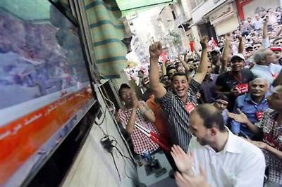 Egypt seeks end to crisis, Adli Masour assures elections will take place in 6 months