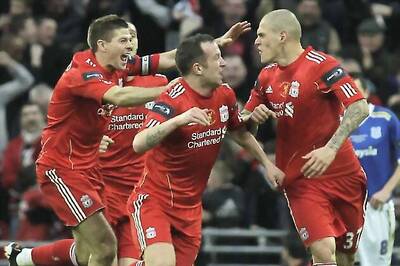 Liverpool edge battling Cardiff to win League Cup