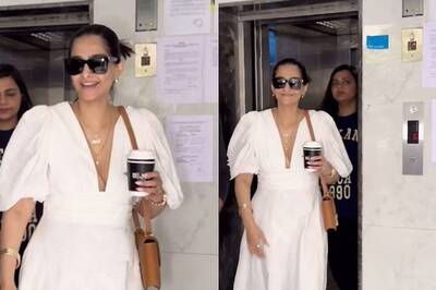 Sonam Kapoor Flashes Smile As She Gets Clicked In White Plunging Neckline Dress, Fans React; Watch