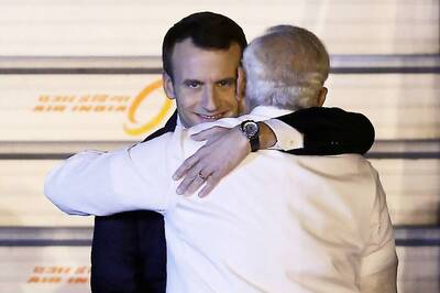 PM Narendra Modi Welcomes French President Emmanuel Macron With Trademark Hug; Talks on Defence, Nuclear Energy Today