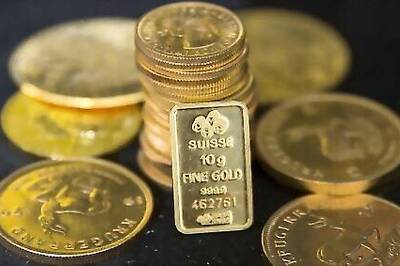 Gold Dips On Stronger Dollar Ahead Of ECB Meeting