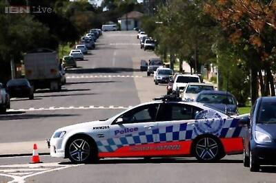 ISIS terrorists planned to behead an Australian, says Tony Abbott after counter-terrorism operation