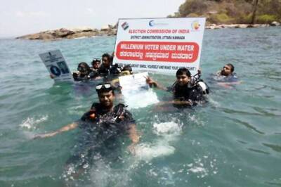 Deputy Commissioner Dives Into Arabian Sea to Distribute Voter ID Cards to Millennials in Karnataka's Karwar