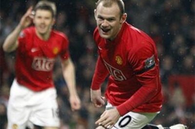 Rooney's 100th league goal helps United down Arsenal