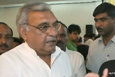 Hooda confidant Nand Lal Poonia resigns after court rap