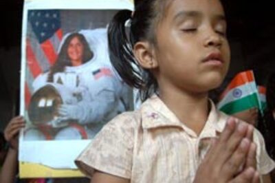 India prays, Atlantis stuck in space