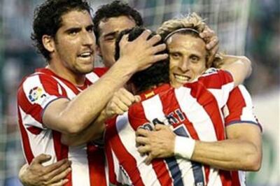 Forlan brace gives Atletico Madrid Euro tonic