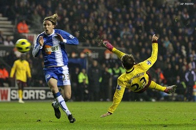 EPL: Arsenal held by Wigan, Chelsea win