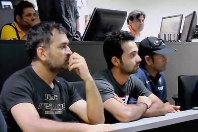 Snapshot: Dhoni sports grey stubble, 'desi boy' T-shirt