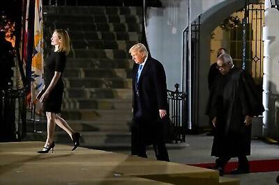 Barrett Swearing-in Differs Markedly From 'SuperSpreader'