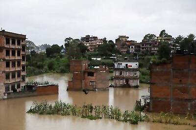 Heavy rains kill four of Nepal family; floods ease in India