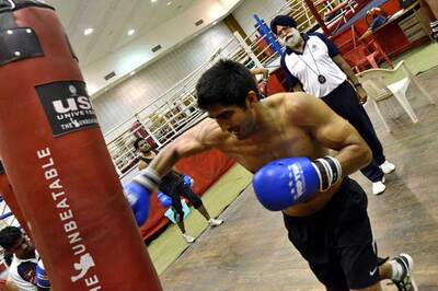 Vijender back to training after doping scam