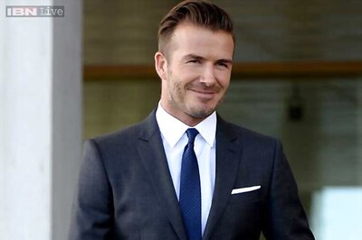 Be patient and give Van Gaal time, says David Beckham
