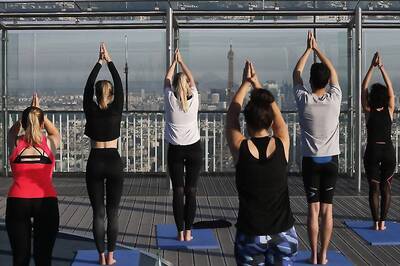 Summer Snapshot: Sky-high Yoga Overlooking The Eiffel Tower in Paris