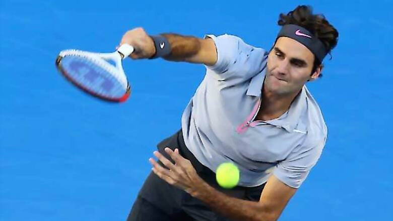 Federer struggles but reaches Hamburg semi-final