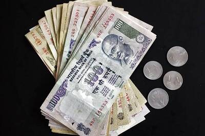 Rupee up 14 paise against dollar in early trade