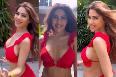 Sexy Nikki Tamboli Flaunts Ample Cleavage in a Bold Red Bikini; Hot Video Goes Viral