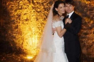 TomKat wed with never-ending kiss