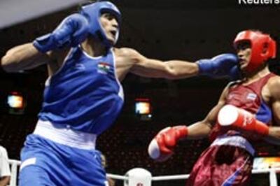 Vijender out punches Angkhan, enters quarters