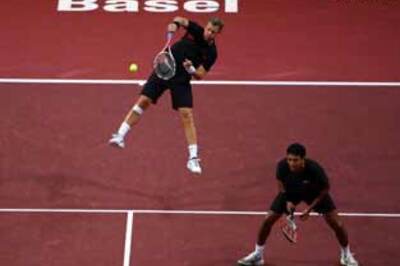 Bhupathi advances in doubles; Paes shocked in mixed doubles