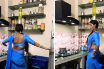 Watch: Woman Balances Herself On Two Small Pots While Dancing