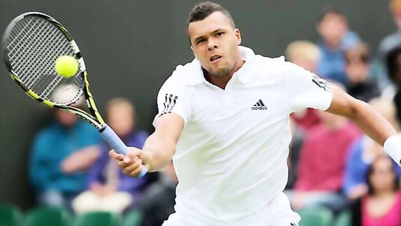 Jo-Wilfried Tsonga reaches 2nd round at Wimbledon