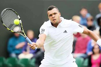 Jo-Wilfried Tsonga reaches 2nd round at Wimbledon