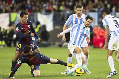 Messi does it all as Barcelona win 3-1 at Malaga