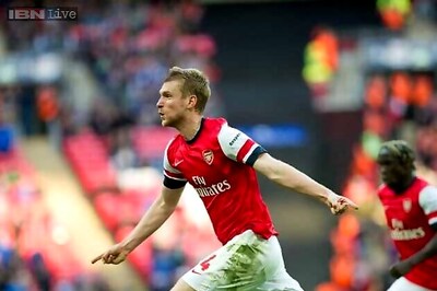 Arsenal beat holder Wigan to reach FA Cup final