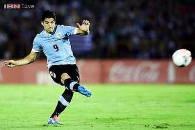Uruguay sweat on Luis Suarez, but in 'better' shape than 2010