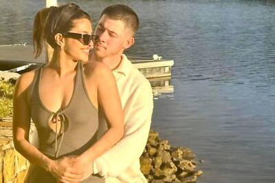 Priyanka Chopra Aces A Casually Chic Look As She Poses With Nick Jonas In A Grey Bodycon Dress