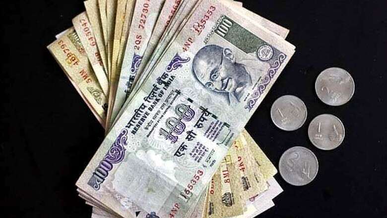 Rupee ends 2 paise lower at 61.19 against dollar
