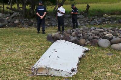 Malaysia says debris found in Indian Ocean 'looks certain' of MH370